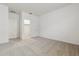 Bedroom featuring neutral carpet and two doors including a closet at 15389 W Cottontail Ln, Surprise, AZ 85387