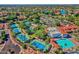 Expansive aerial view featuring tennis courts, a swimming pool, and beautifully landscaped community grounds at 1633 E Lakeside Dr # 127, Gilbert, AZ 85234
