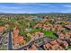 Aerial view showcasing the community's swimming pool and mature trees near the residences at 1633 E Lakeside Dr # 127, Gilbert, AZ 85234
