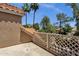 This balcony shows nice views with a tile roof and secure latticework at 1633 E Lakeside Dr # 127, Gilbert, AZ 85234