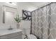 Bright bathroom featuring a modern sink and vanity area, complemented by stylish decor and a framed mirror at 1633 E Lakeside Dr # 127, Gilbert, AZ 85234