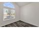 Well-lit bedroom with a bright window, showcasing its spacious design, modern window, and sleek, modern flooring at 1633 E Lakeside Dr # 127, Gilbert, AZ 85234
