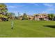 Lush green lawn offering serene views of the homes in this well-maintained community at 1633 E Lakeside Dr # 127, Gilbert, AZ 85234