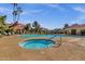 Beautiful community pool featuring a hot tub, lounge chairs, and well-maintained landscaping at 1633 E Lakeside Dr # 127, Gilbert, AZ 85234