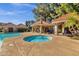 Inviting community pool area with hot tub and covered seating, perfect for relaxation at 1633 E Lakeside Dr # 127, Gilbert, AZ 85234