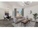 Inviting living room features vaulted ceilings, neutral tones, and ample natural light at 1633 E Lakeside Dr # 127, Gilbert, AZ 85234