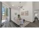 Bright living room with sliding glass door leads to outdoor space with vaulted ceiling at 1633 E Lakeside Dr # 127, Gilbert, AZ 85234
