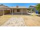 View of the house from the backyard featuring a patio and lawn at 1739 E Carter Rd, Phoenix, AZ 85042