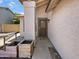 Inviting front porch with decorative planters and a secure, screened front door at 1739 E Carter Rd, Phoenix, AZ 85042