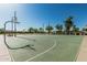 Well-lit basketball court ready for games and practice, with a clean surface and clear markings at 19576 N Portarosa Ct, Maricopa, AZ 85138