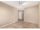 This bedroom is ready for you, with easy access to the hall at 19576 N Portarosa Ct, Maricopa, AZ 85138