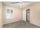 Bedroom with plantation shutters and closet at 19576 N Portarosa Ct, Maricopa, AZ 85138