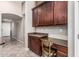 Kitchen features a desk nook for working or a homework station. Plenty of storage! at 19576 N Portarosa Ct, Maricopa, AZ 85138