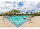 Fantastic community pool with sunshades and clear blue water for a refreshing swim at 19576 N Portarosa Ct, Maricopa, AZ 85138