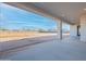 Covered back patio with a view of the beautiful Arizona desert landscape at 2005 W Lincoln Ct, Queen Creek, AZ 85144