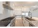Beautiful kitchen featuring granite counters, stainless steel appliances, and lots of cabinet space at 2005 W Lincoln Ct, Queen Creek, AZ 85144