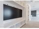 Functional mudroom with coat rack, shelves, and a bench for storage at 2005 W Lincoln Ct, Queen Creek, AZ 85144