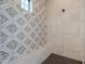Shower features stylish tile work and a built-in bench at 2005 W Lincoln Ct, Queen Creek, AZ 85144