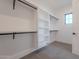 Organized walk-in closet with ample shelving and hanging space at 2005 W Lincoln Ct, Queen Creek, AZ 85144