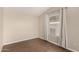 Bright bedroom featuring modern blinds, neutral paint, and stylish wood-look flooring at 201 S Greenfield Rd # 29, Mesa, AZ 85206