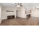 Spacious living room featuring modern wood flooring and an open concept to the kitchen at 201 S Greenfield Rd # 29, Mesa, AZ 85206