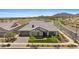 Beautiful single-story home featuring well-maintained landscaping and a welcoming front porch at 20795 W San Juan Ave, Buckeye, AZ 85396