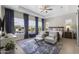 Bedroom with wood ceiling, ceiling fan, and outdoor views at 20795 W San Juan Ave, Buckeye, AZ 85396
