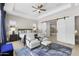 Bedroom with wood ceiling, ceiling fan, and views of the backyard at 20795 W San Juan Ave, Buckeye, AZ 85396