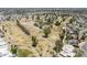 Aerial shot of desert golf course featuring ponds, trees, and winding paths through the landscape at 2178 E Golf Ave, Tempe, AZ 85282