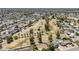 Wide aerial view of a desert golf course lined with houses and palm trees at 2178 E Golf Ave, Tempe, AZ 85282
