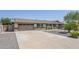 Charming single-story home featuring a two-car garage, desert landscaping, and brick accents at 2178 E Golf Ave, Tempe, AZ 85282