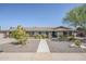 Charming one-story home features manicured landscaping, blue shutters, and a welcoming entrance at 2178 E Golf Ave, Tempe, AZ 85282