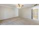 Carpeted living room with light walls and ceiling fan at 2178 E Golf Ave, Tempe, AZ 85282