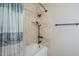 Shower with a combination of tile, tub, and hand-held shower at 2178 E Golf Ave, Tempe, AZ 85282