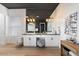 Elegant bathroom with double vanity, modern lighting, and sleek fixtures, offering a luxurious experience at 2225 N 38Th Way, Phoenix, AZ 85008