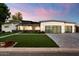 Stunning modern home with a two-car garage and well-maintained landscaping at 2225 N 38Th Way, Phoenix, AZ 85008