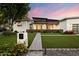 Charming home with a well-manicured lawn and inviting walkway at 2225 N 38Th Way, Phoenix, AZ 85008