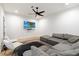 Living room featuring a sectional couch and TV at 2225 N 38Th Way, Phoenix, AZ 85008