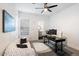 Bright home office featuring a desk, couch and ceiling fan at 2225 N 38Th Way, Phoenix, AZ 85008
