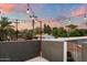 Rooftop deck features string lights, panoramic views, and a relaxing atmosphere at 2225 N 38Th Way, Phoenix, AZ 85008