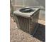 Energy-efficient York air conditioner unit on a concrete slab surrounded by a gravel yard at 2233 E Behrend Dr # 29, Phoenix, AZ 85024