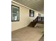 A large covered patio space with concrete flooring offers ample room for outdoor entertaining at 2233 E Behrend Dr # 29, Phoenix, AZ 85024