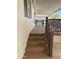 The inviting front porch features wooden steps and railings, leading to a covered outdoor space at 2233 E Behrend Dr # 29, Phoenix, AZ 85024
