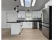 Well-equipped kitchen with stainless steel appliances, and bright lighting at 2233 E Behrend Dr # 29, Phoenix, AZ 85024