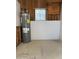 The utility room displays a water heater and pegboard, with a window for natural light and ventilation at 2233 E Behrend Dr # 29, Phoenix, AZ 85024
