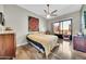 Bright, spacious bedroom with hardwood floors and a view to the outside balcony at 2302 N Central Ave # 311, Phoenix, AZ 85004