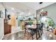 Cozy dining room boasts stylish lighting, hardwood floors, and an open connection to the kitchen at 2302 N Central Ave # 311, Phoenix, AZ 85004