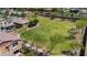 Aerial view showcasing the community park and walking path, nestled within a vibrant neighborhood at 242 N Crosscreek Dr, Chandler, AZ 85225