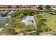 Aerial view of neighborhood basketball court with trees, pathways and residential area at 242 N Crosscreek Dr, Chandler, AZ 85225