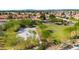 Aerial view of neighborhood basketball court surrounded by desert trees at 242 N Crosscreek Dr, Chandler, AZ 85225